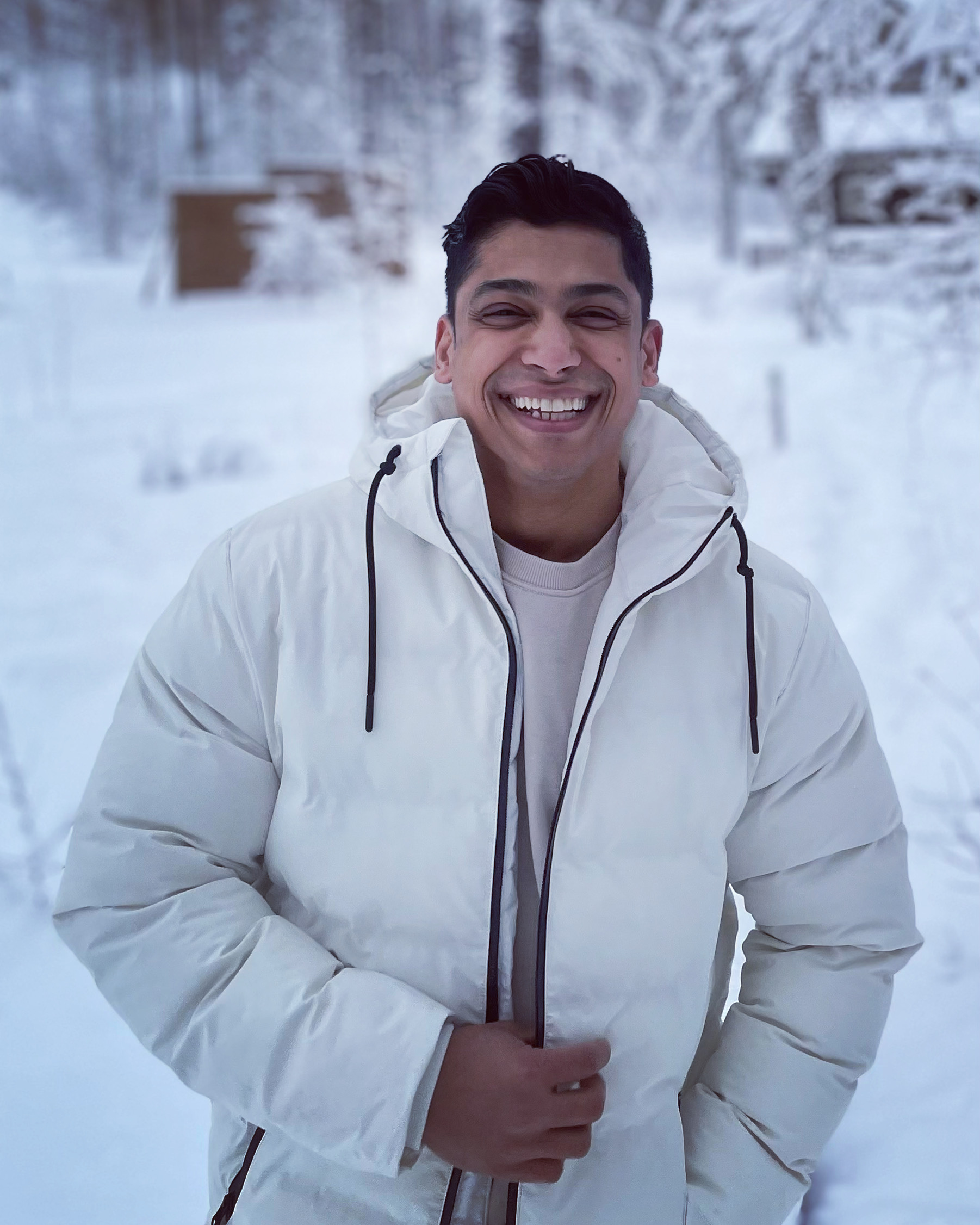 A photo of me smiling in the snow